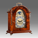 Mantel clock, Art.321/5 Briar of walnut with moon-phase dial - Westminster melody with on rod gong